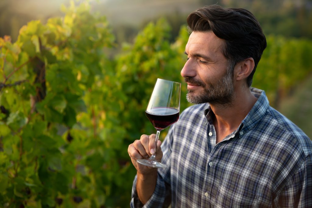 man tasting wine in France