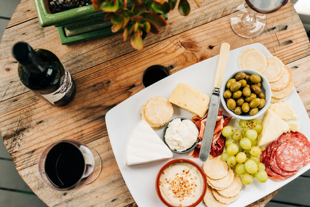 French food including cheese, fruit and olives