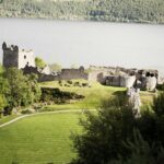 Explore the ruins of Urquhart Castle, beautifully situated on Loch Ness in Scotland.